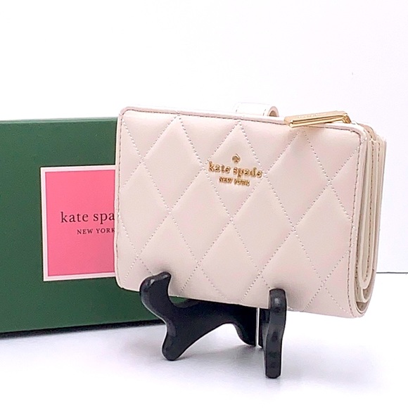 kate spade Handbags - KATE SPADE Carey Medium Compact
Bifold Wallet Parchment Color